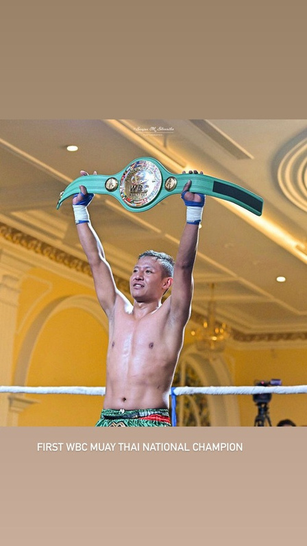 First WBC Muay Thai national champion raises the belt